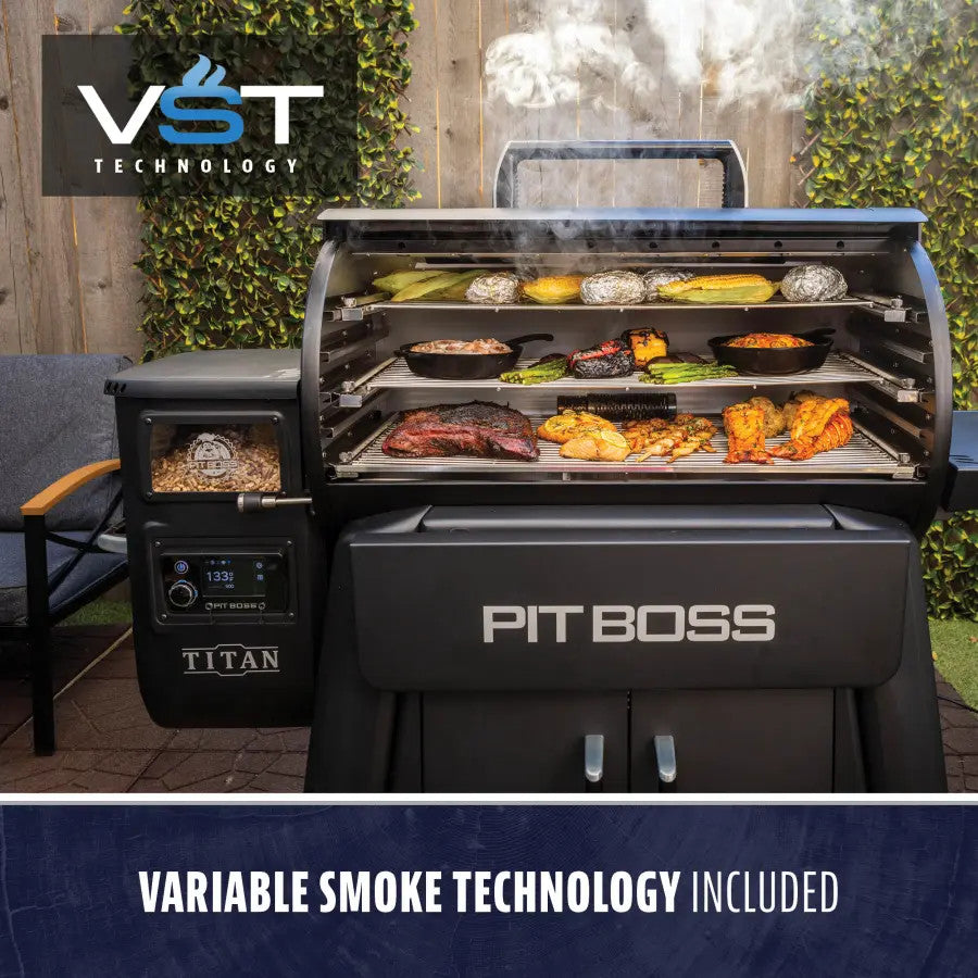 Black Pit Boss Titan grill with variable smoke technology, cooking assorted meats and vegetables.