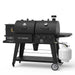 Black Pit Boss Competition Series pellet grill with propane tank attachment.