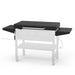 Black Pit Boss grill with side shelves and control knobs.