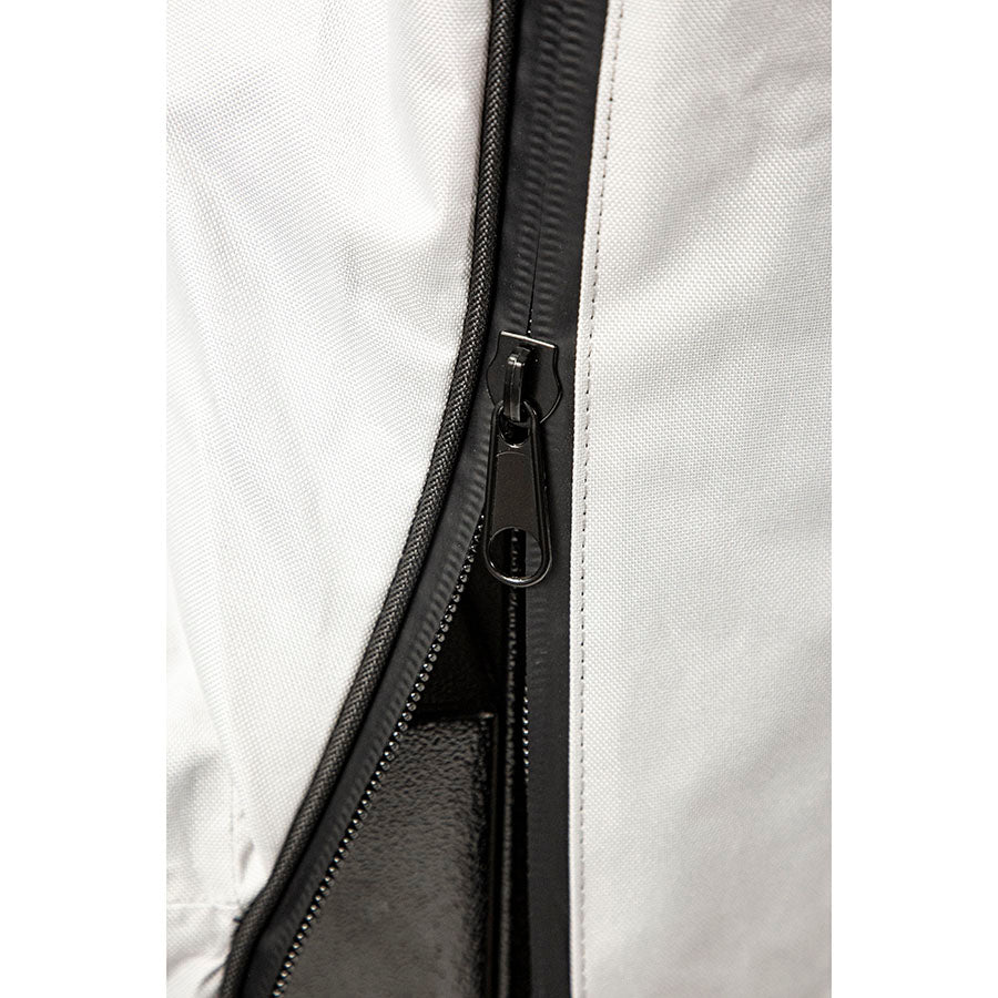 White bag with black zipper and pull tab.