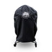 Black Pit Boss grill cover on wheeled stand.