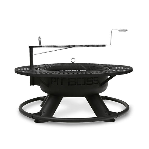 Round black metal fire pit with mesh cover and adjustable grill grate, labeled "PIT BOSS" on the side.