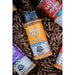 Orange "Mango Magic Rub" seasoning by Pit Boss with garlic, onion, and mango flavors.