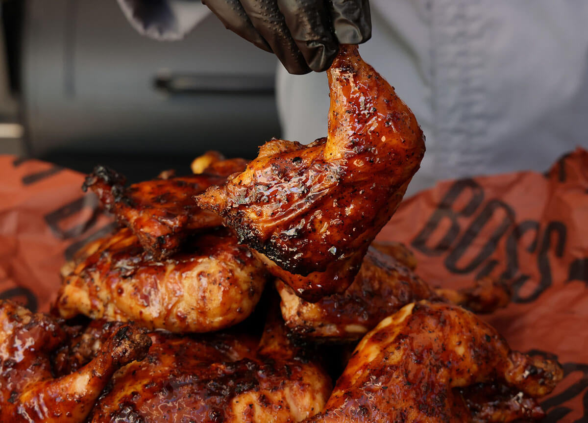 Grilled BBQ Chicken Leg Quarters cooked on Pit Boss Wood Pellet Grill with BBQ Sauce and Seasoning
