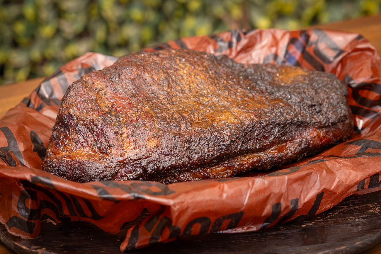 smoked hot and fast beef brisket in pit boss bbq butcher paper
