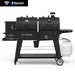 Black Pit Boss Competition Series smoker with Bluetooth connectivity and propane tank.