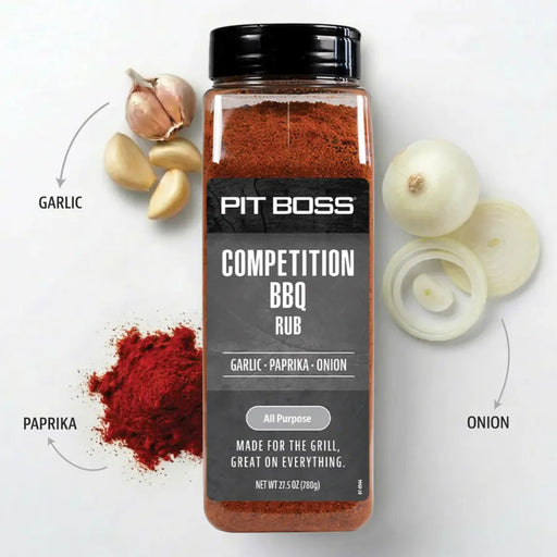 Pit Boss Competition BBQ Rub, 27.5 oz. Blend of garlic, paprika, and onion in a clear plastic shaker bottle with black lid.