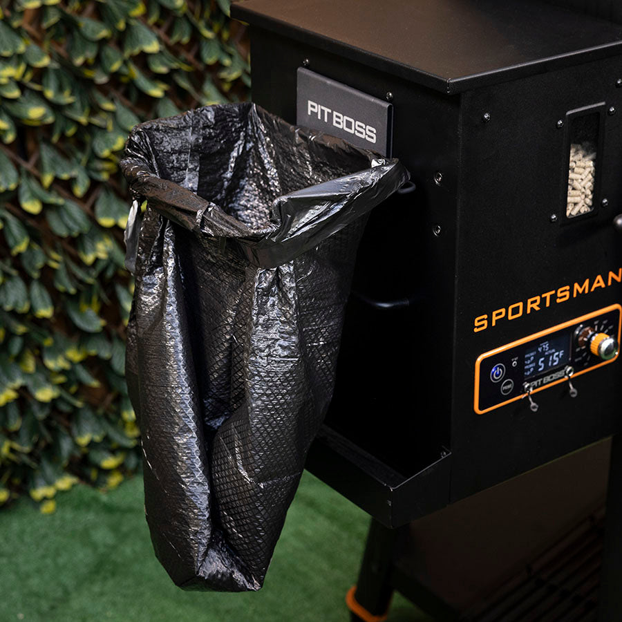 Black Pit Boss Sportsman pellet grill with ash bag attached.