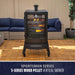 Black vertical wood pellet smoker with glass door, visible food racks, and "Sportsman" label on front. Outdoor setting.