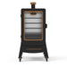 Black Pit Boss Copperhead smoker with glass door and wheels.