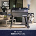 Dark gray Pit Boss DX Series 1150 wood pellet grill with digital control panel and smoker box.