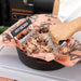 Black Pit Boss shredding tool for pulled pork in a bowl.