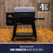 Black Pit Boss Navigator 1300 Connected Wood Pellet Grill on wooden deck.