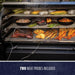 "Black multi-level smoker with meats, vegetables, and seafood cooking, two meat probes included."
