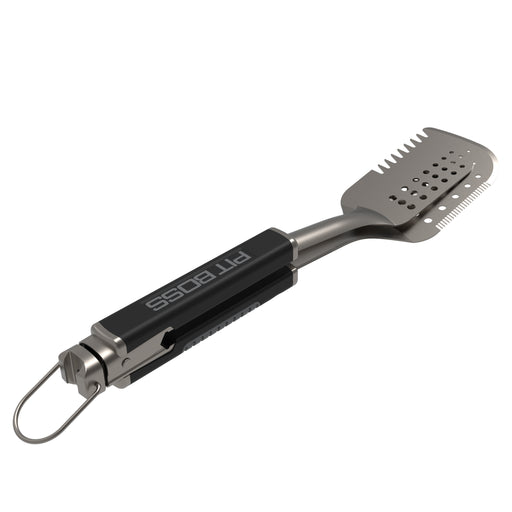 Stainless steel BBQ spatula with serrated edge, perforated blade, and black handle labeled "PIT BOSS."