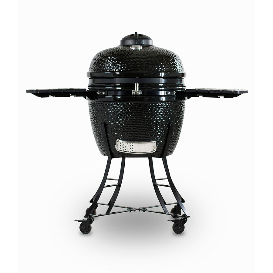 Black kamado-style grill with side shelves and wheels.