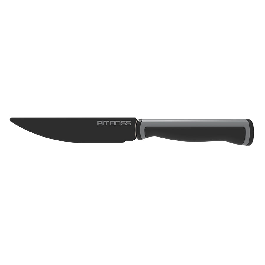 Black Pit Boss steak knife with ergonomic handle.
