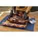 "Beef brisket wrapped in foil, prepared for smoking or cooking."
