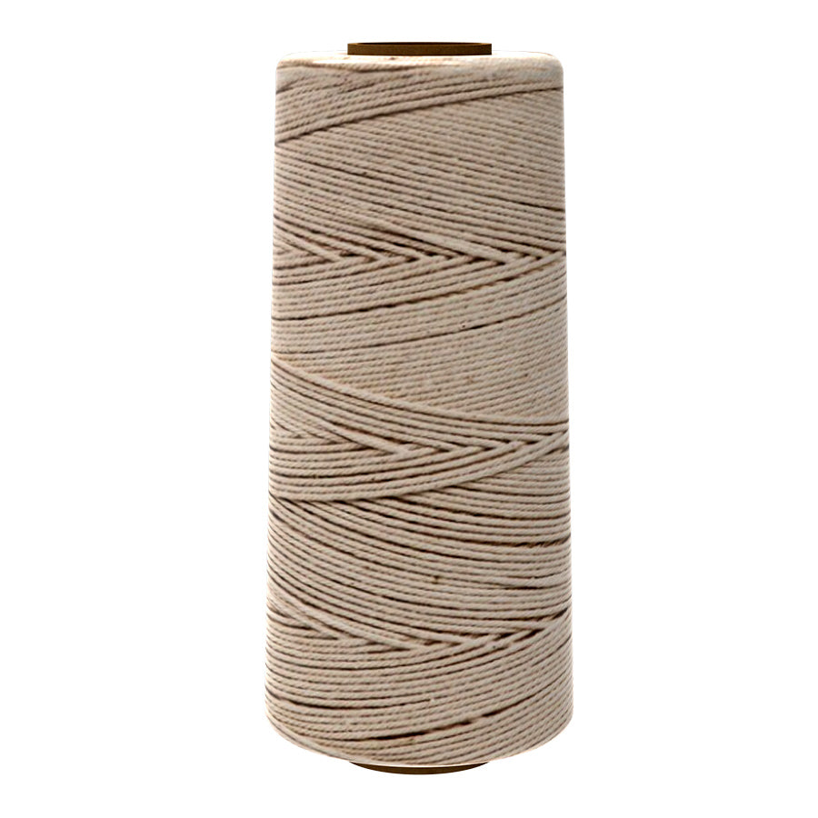 Natural cotton twine spool, beige color, tightly wound.