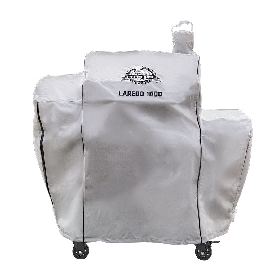White Laredo 1000 grill cover with black wheels and handle.