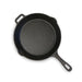Black cast iron skillet with two handles.