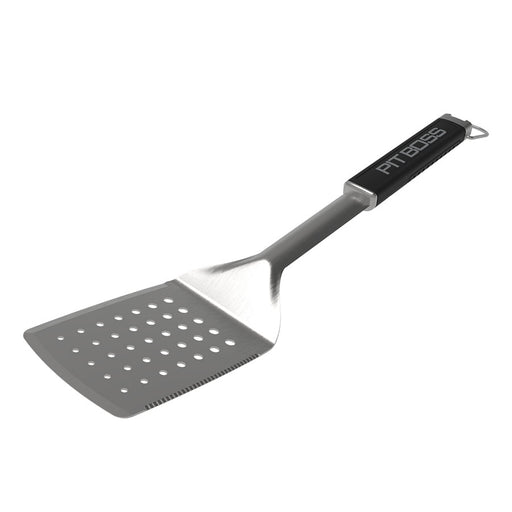 Black and silver perforated spatula with "PITBOSS" handle.