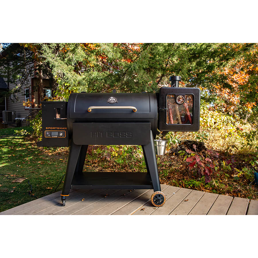 Black Pit Boss Sportsman pellet grill with digital control panel and wheels.