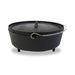 Black cast iron Dutch oven with lid and handles.