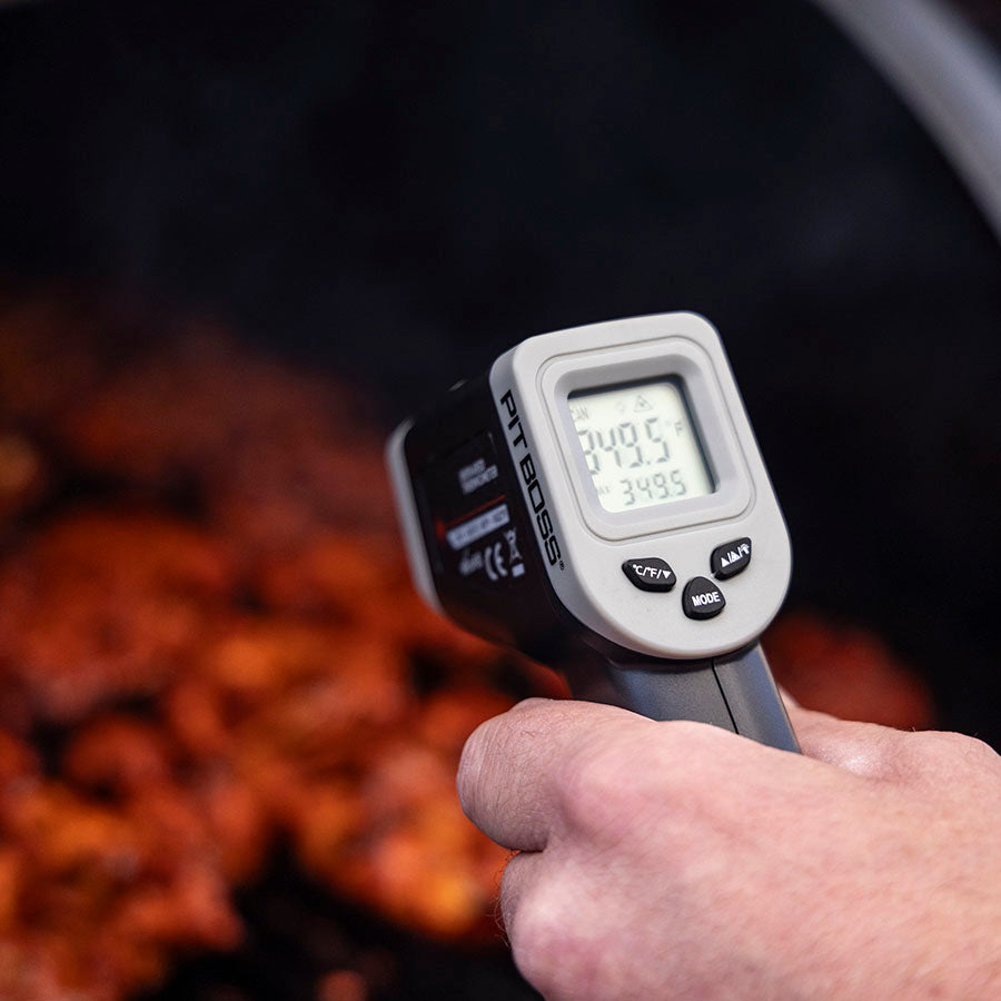 White PIT BOSS infrared thermometer displaying 348.5°F.