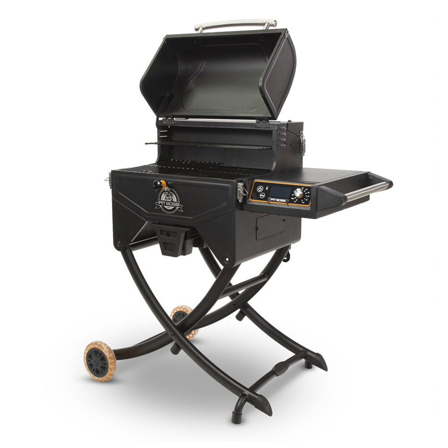 Portable black pellet grill with folding legs, side shelf, control knob, and wheels for easy transport.