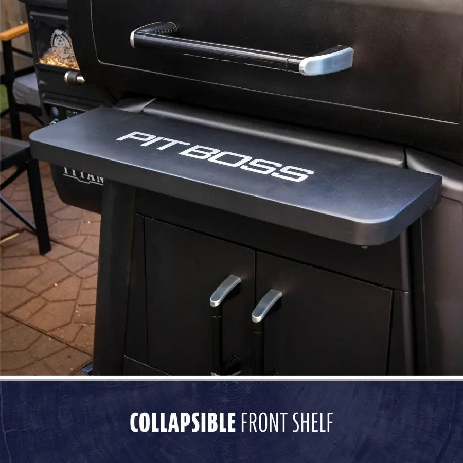 Black Pit Boss grill with collapsible front shelf.