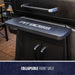 Black Pit Boss grill with collapsible front shelf.
