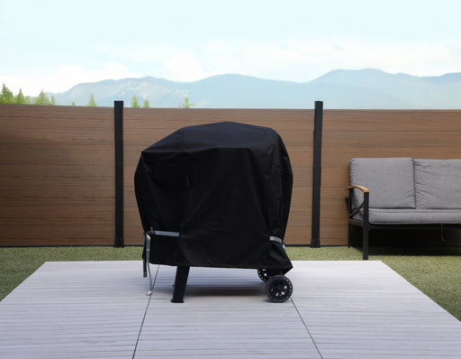 Pit Boss Medium Universal Grill Cover designed for 36” to 45” grills in the backyard 